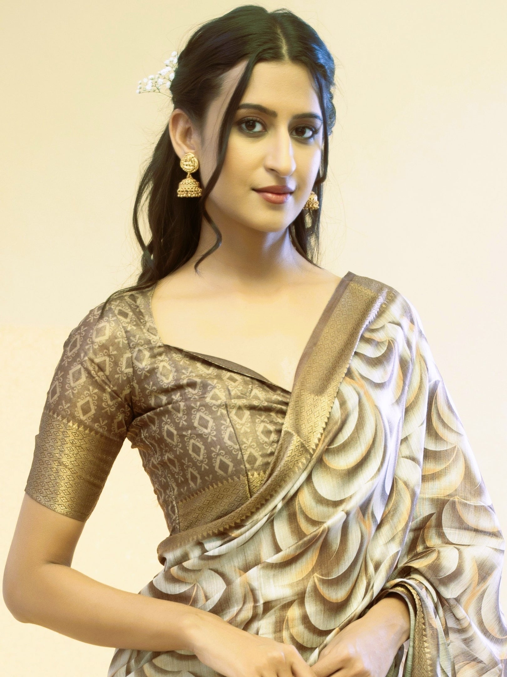 Bronze and Cream Abstract Wave Print Saree with Antique Gold Zari Border