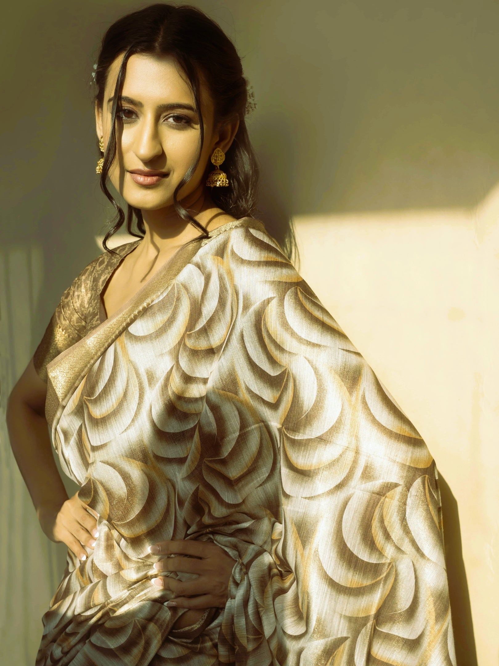 Bronze and Cream Abstract Wave Print Saree with Antique Gold Zari Border
