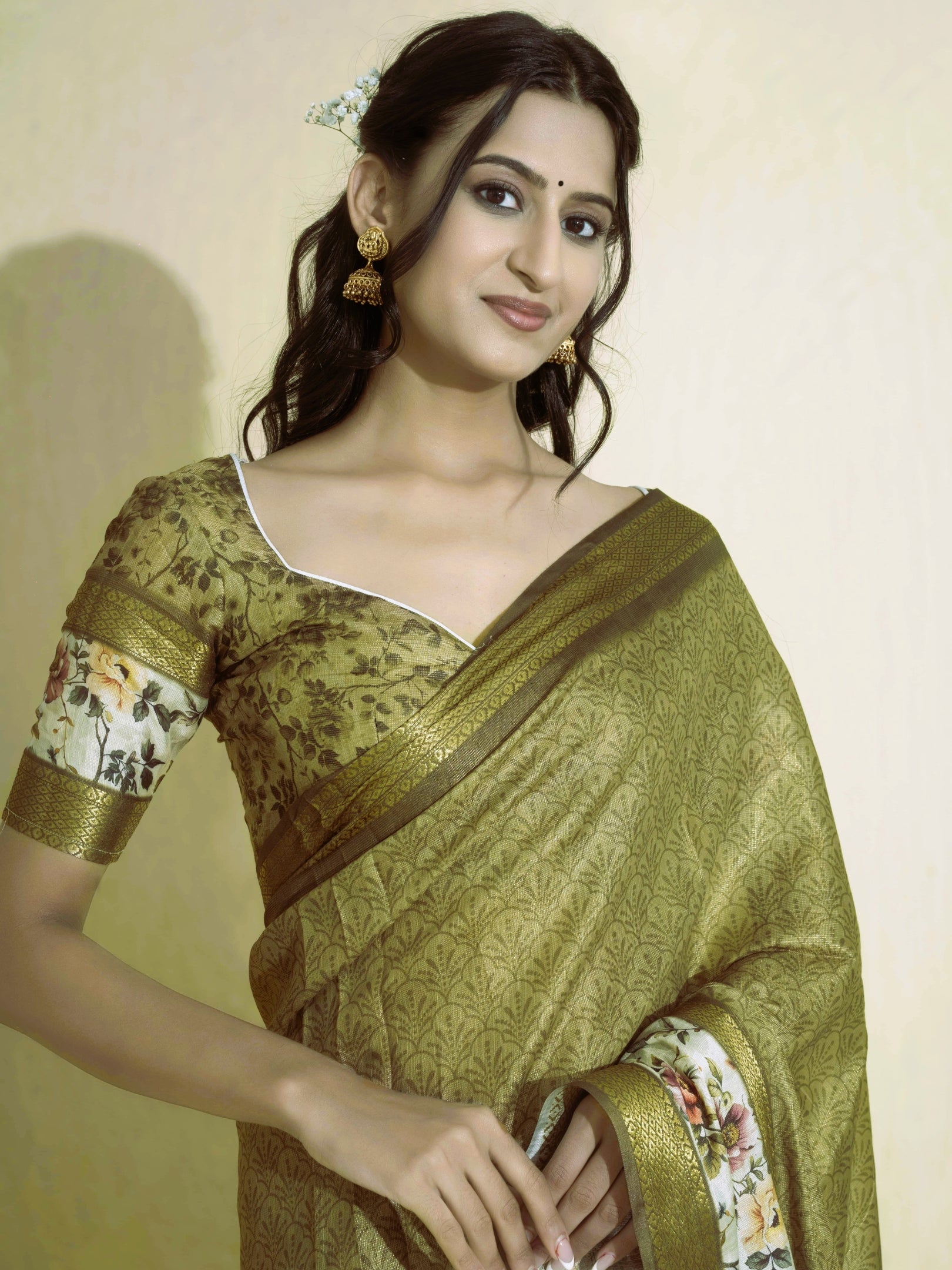 Antique Gold Olive Textured Saree with Floral Border and Zari Accents