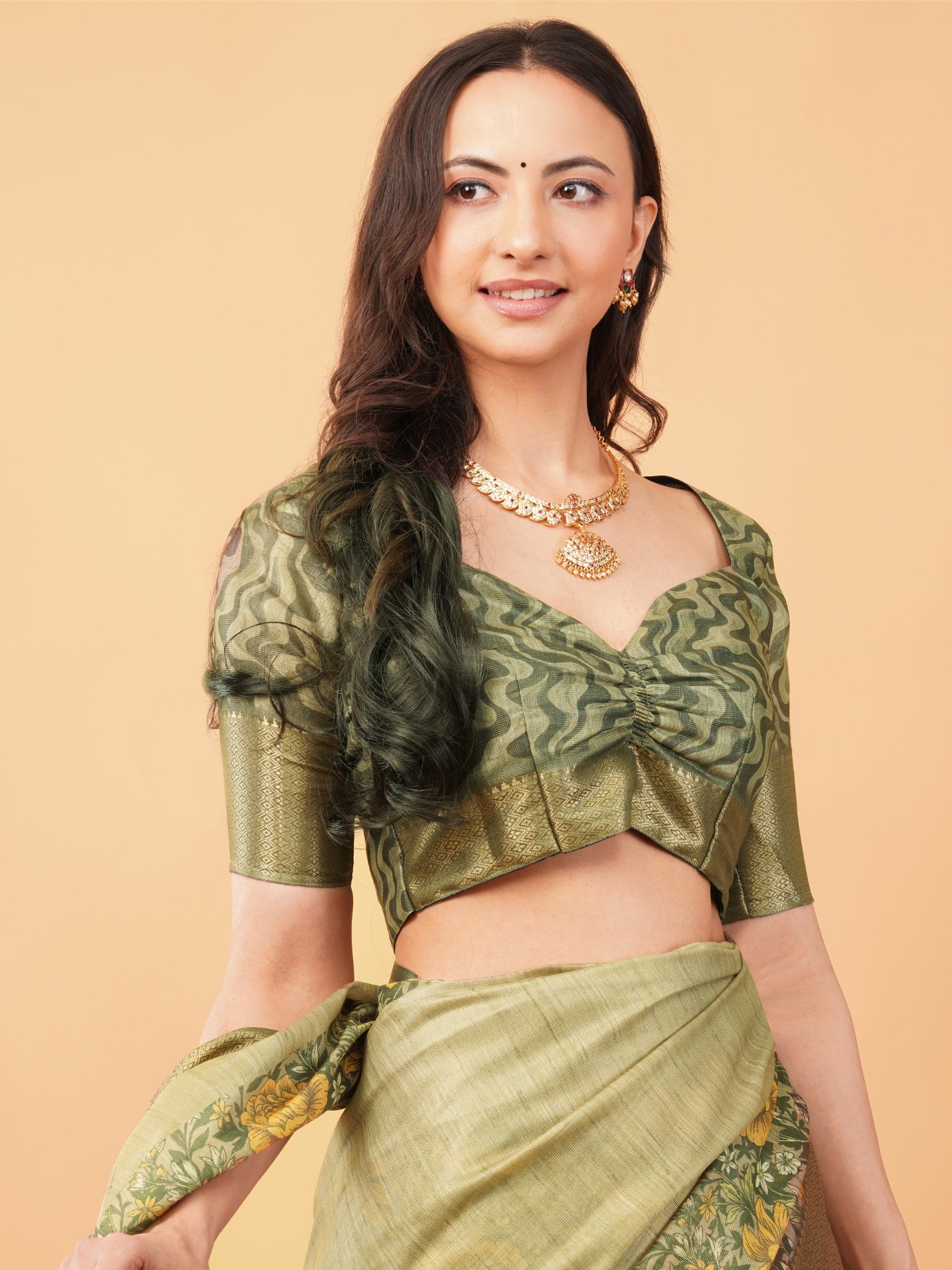 Metallic Gold Floral Saree with Floral Border and Tassel Pallu