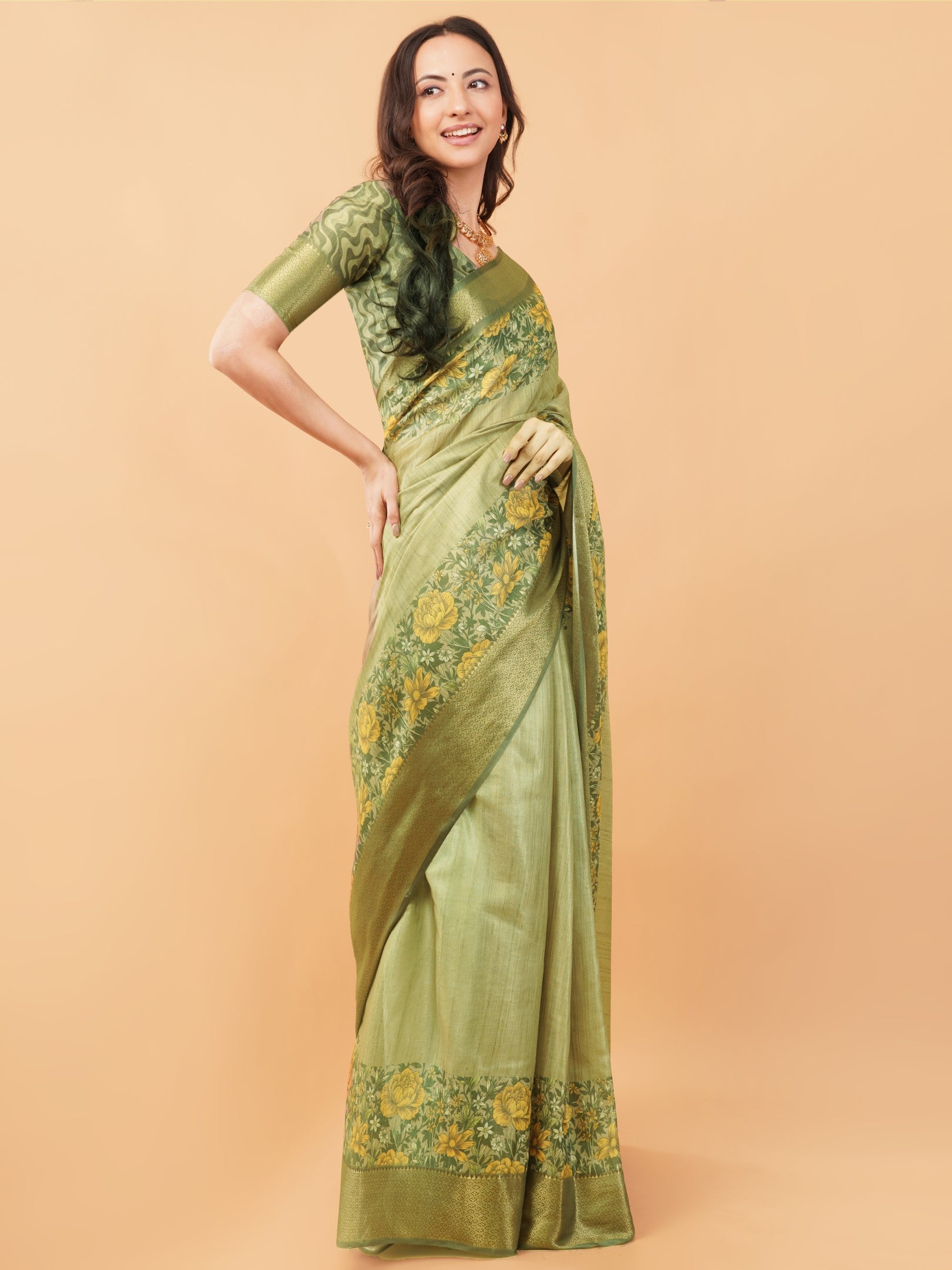 Metallic Gold Floral Saree with Floral Border and Tassel Pallu