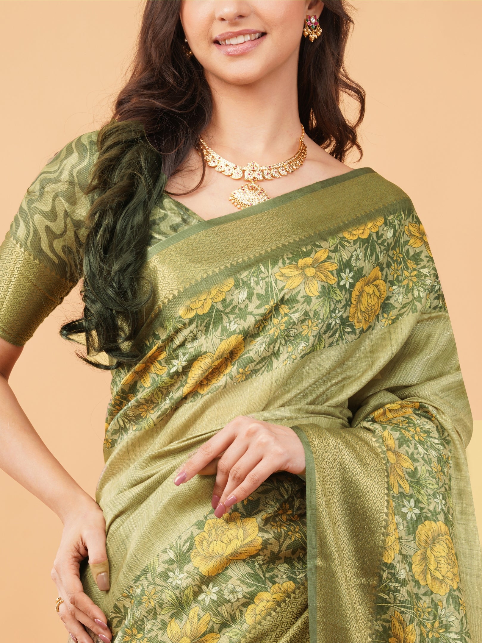 Metallic Gold Floral Saree with Floral Border and Tassel Pallu