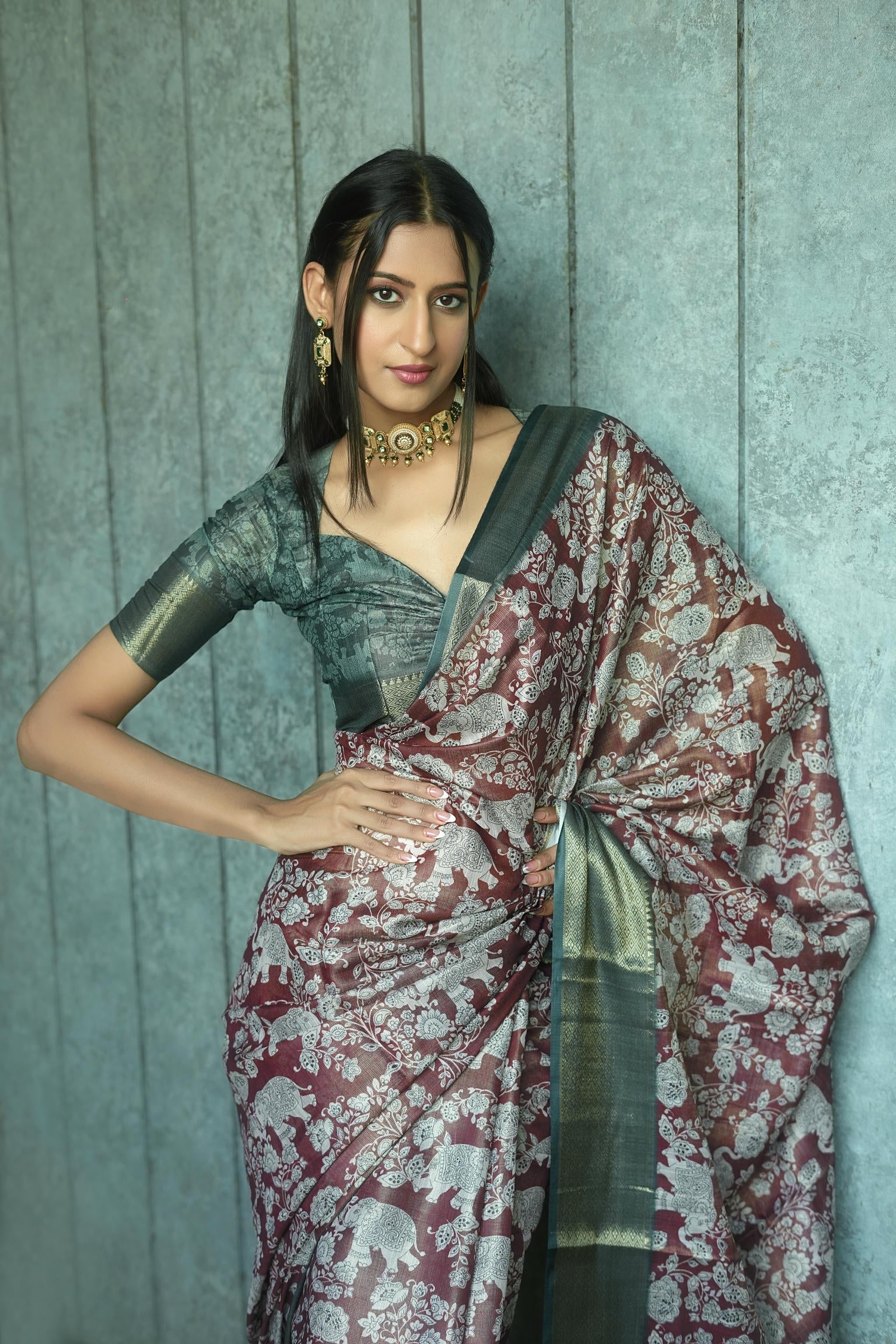 Maroon Floral and Elephant Print Saree with Antique Zari Border