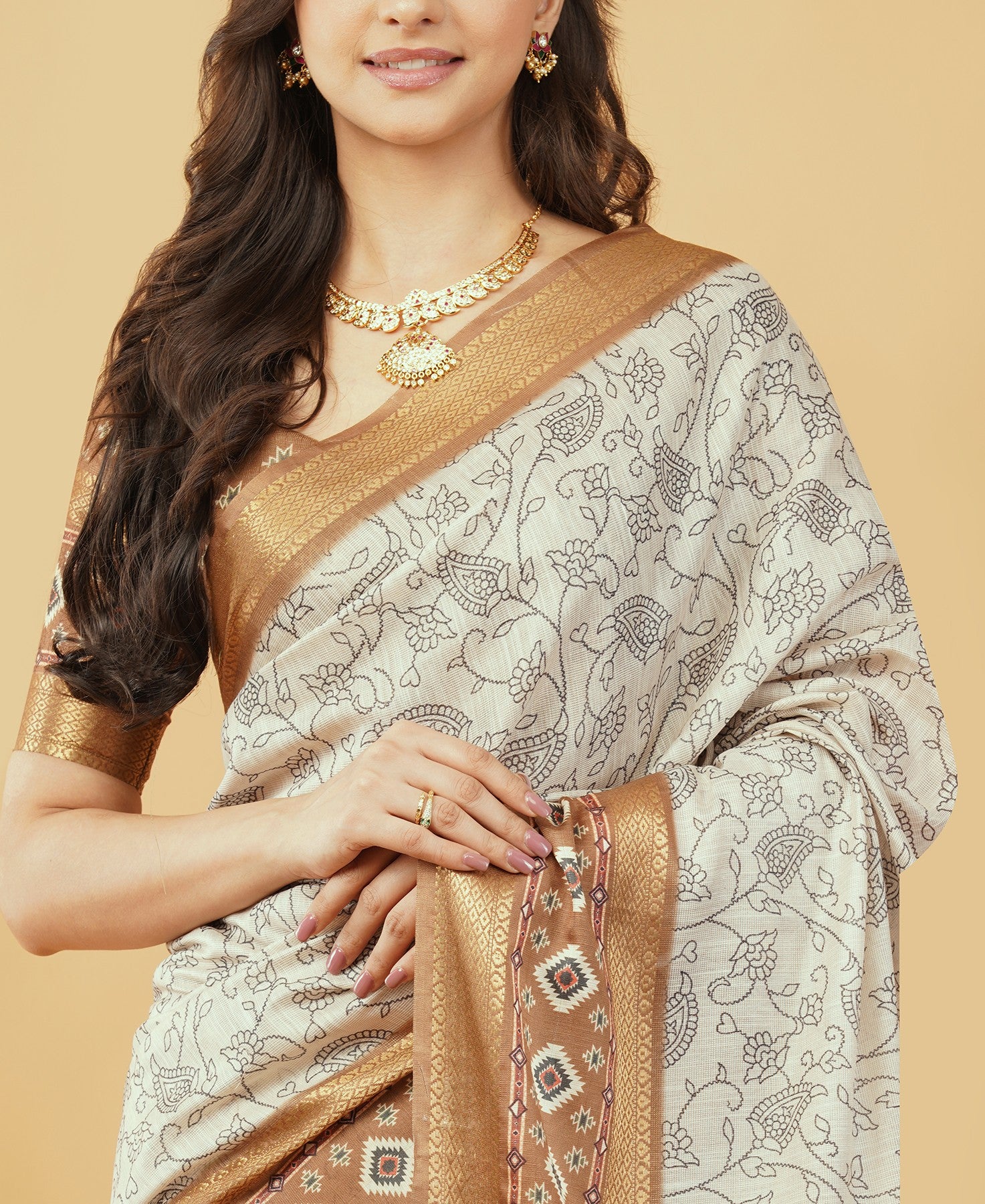Off-White Kalamkari-Inspired Floral Saree with Copper Zari Border
