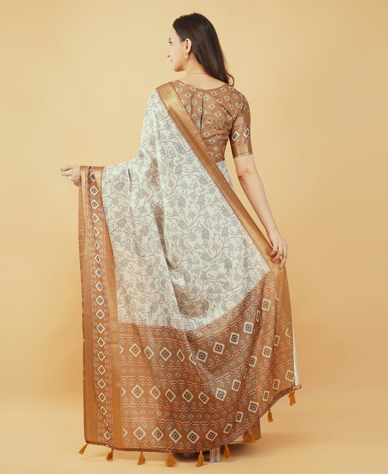 Off-White Kalamkari-Inspired Floral Saree with Copper Zari Border