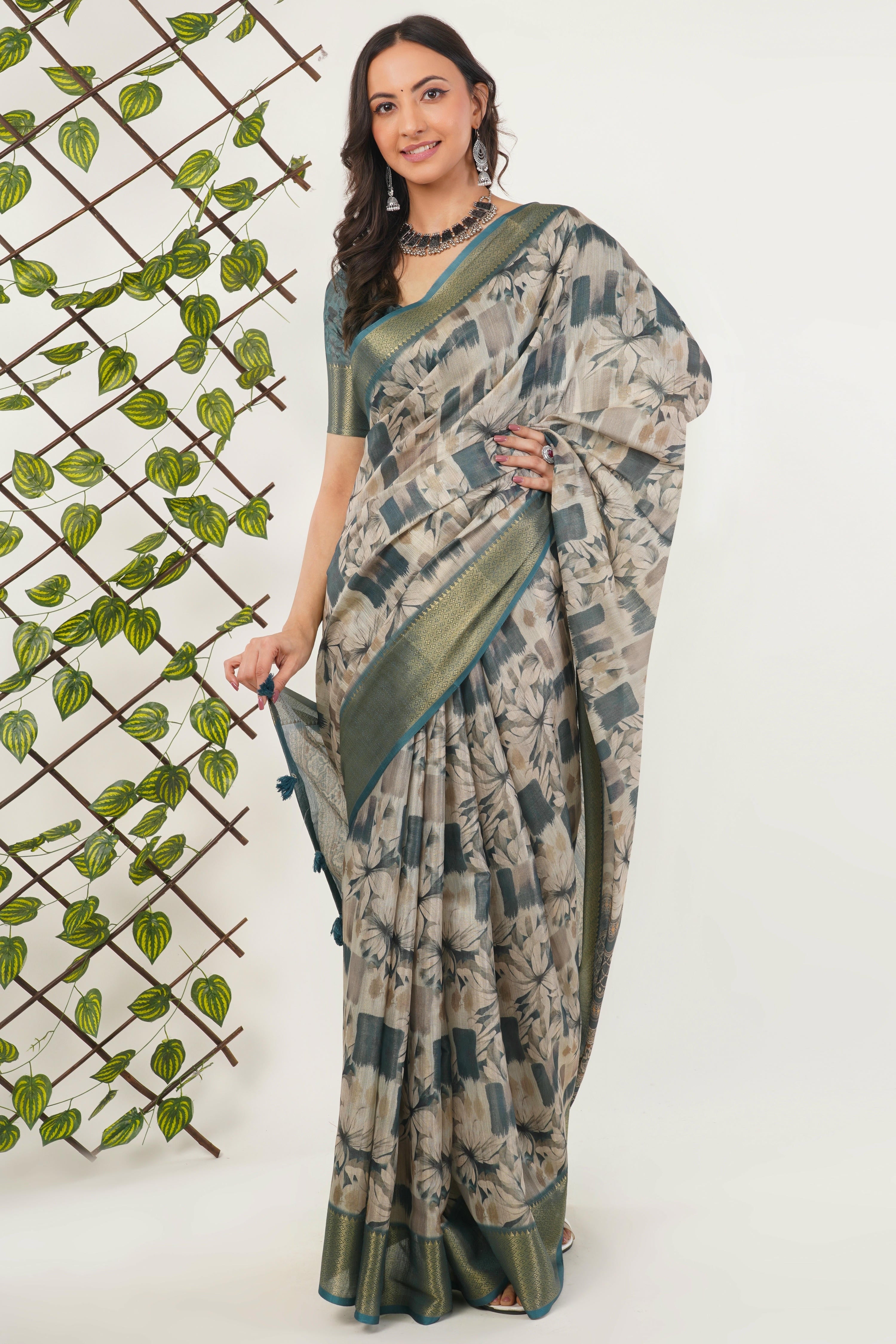 Off-White Floral Print Saree with Teal Zari Border
