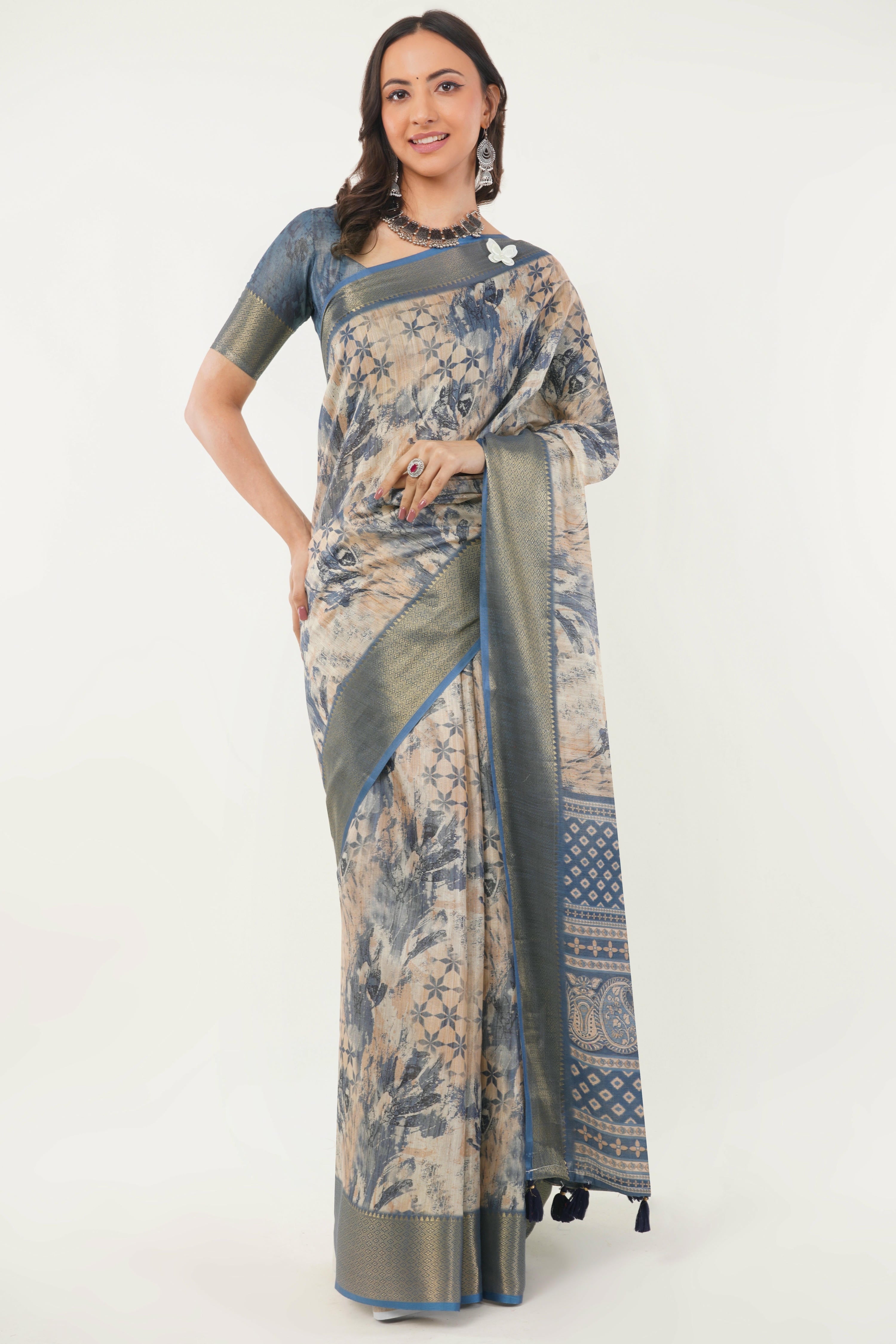 Dusty blue and beige abstract print saree with zari border, tassel pallu and ruched blouse