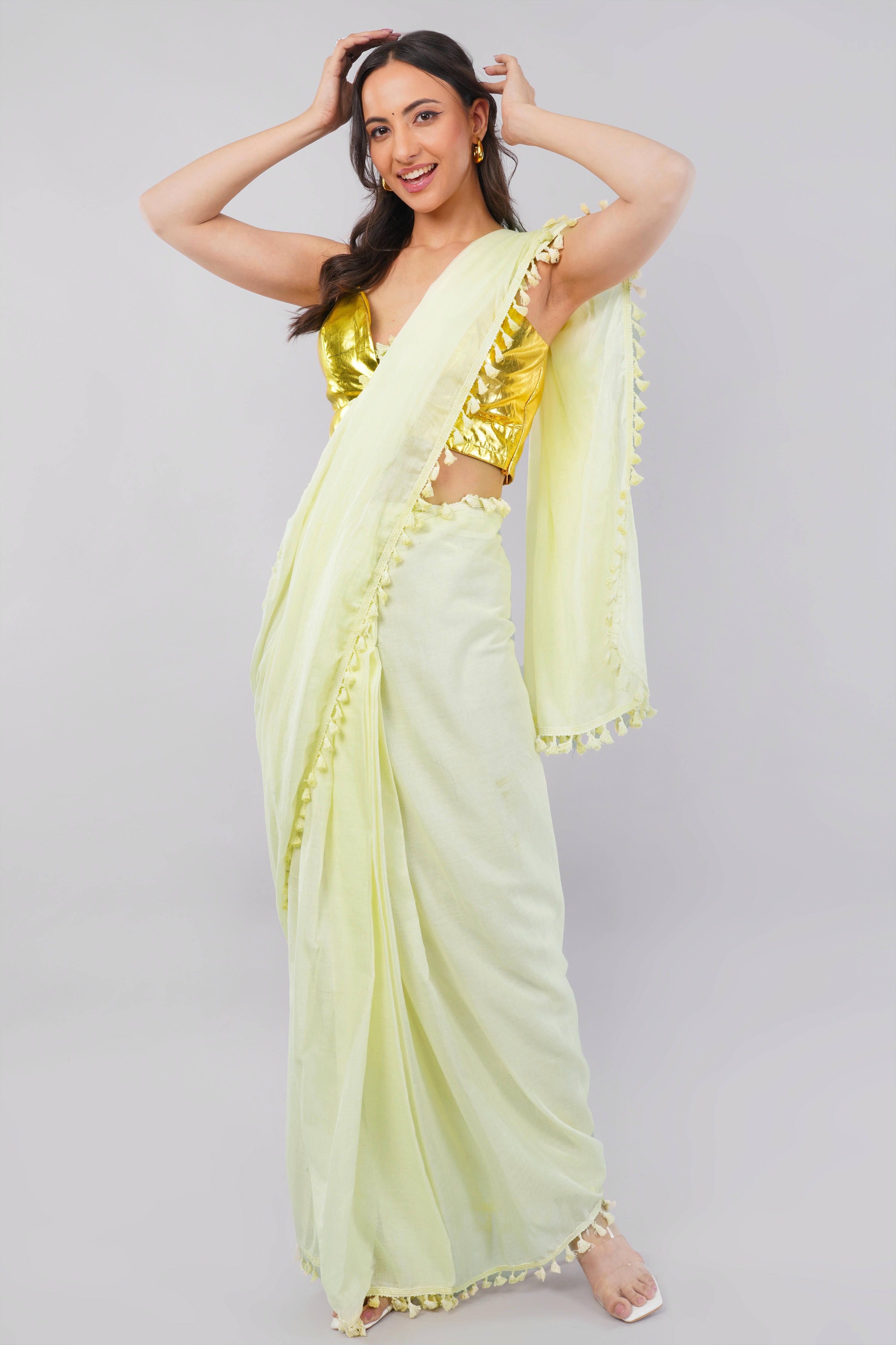 Lemon yellow ready-to-wear saree with pocket, lace tassel border and metallic gold blouse