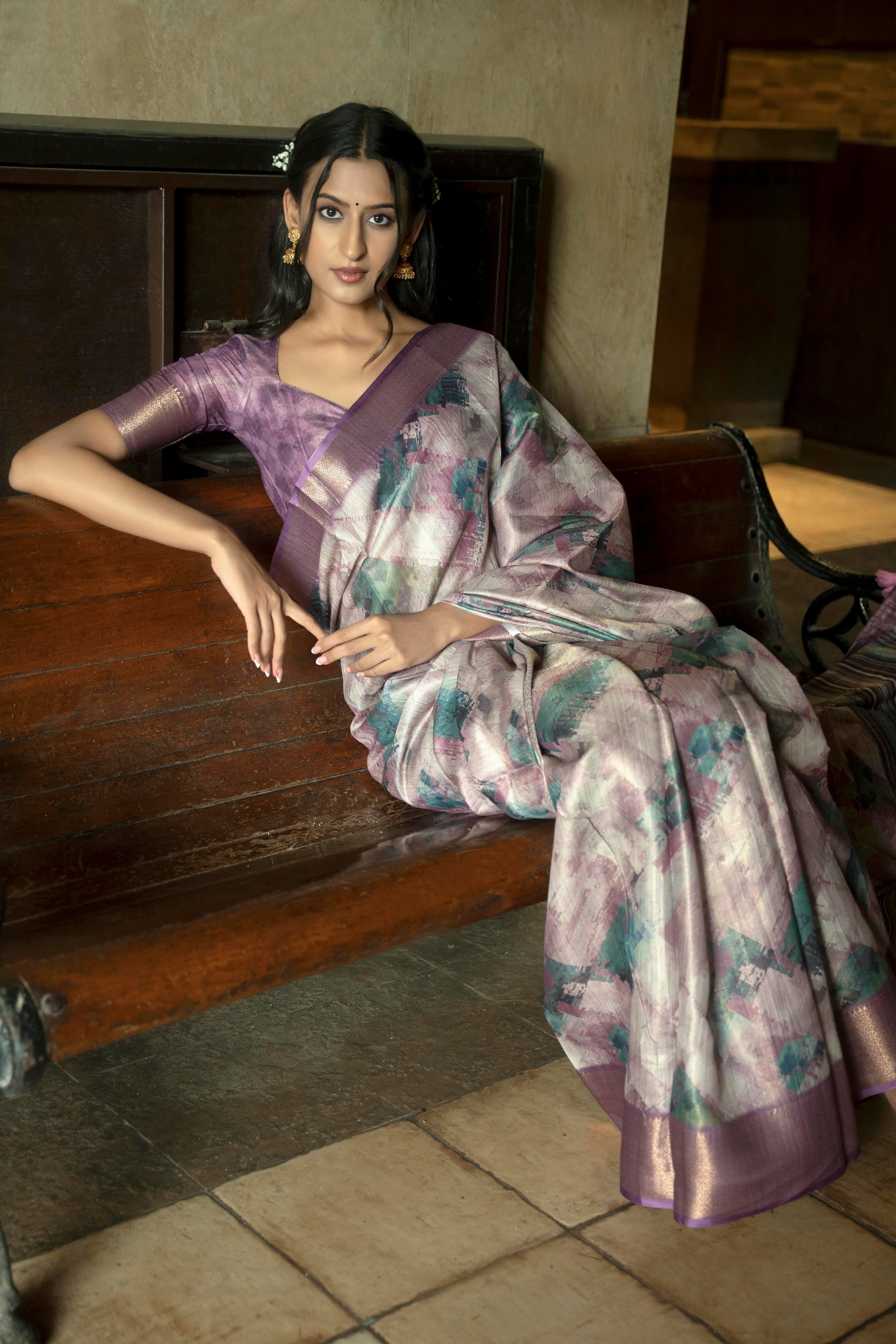 Lavender abstract print saree with rose-gold zari border and striped pallu