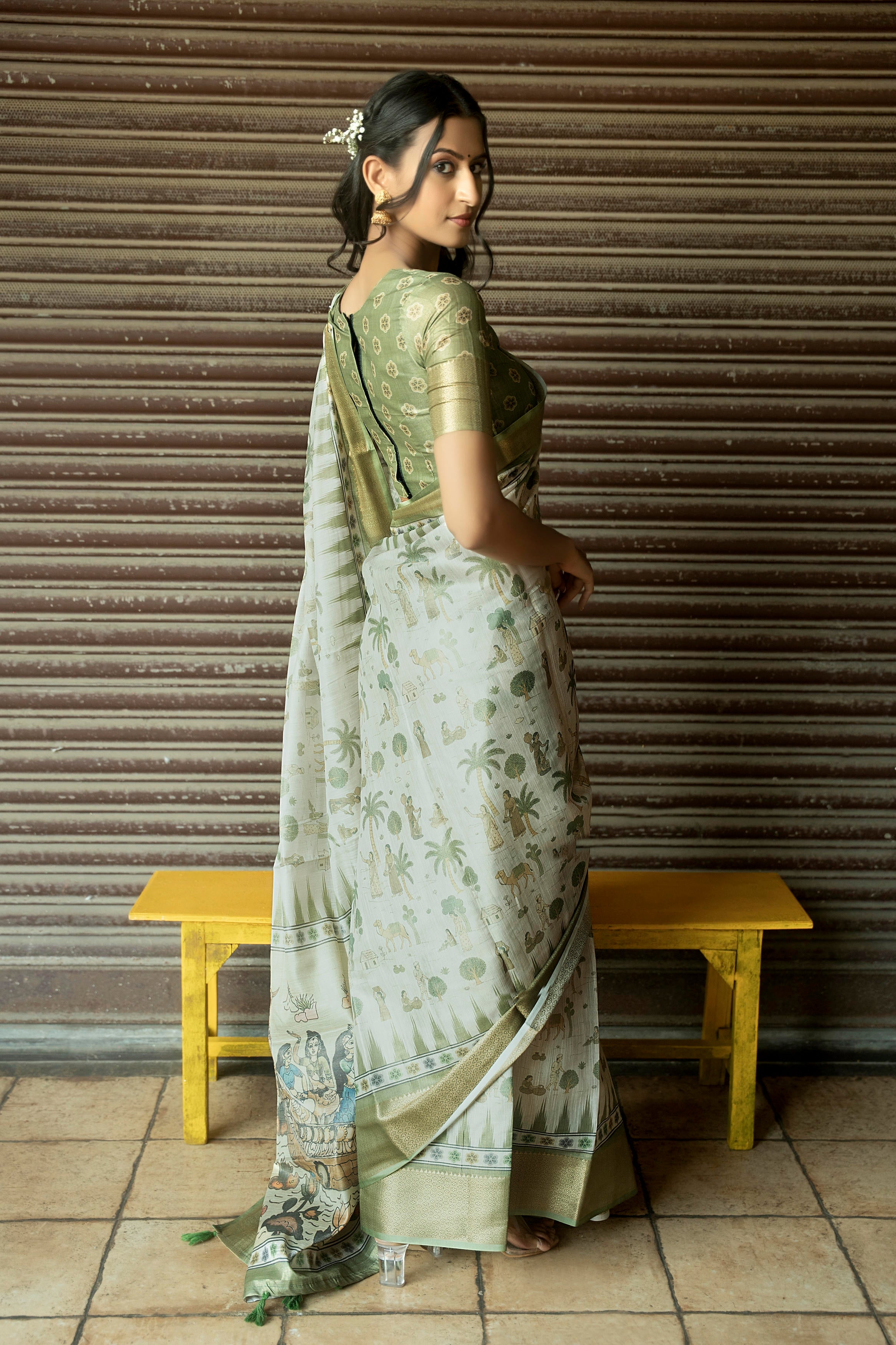 Sage Green and Cream Village Life Illustrative Saree with Antique Gold Zari Border