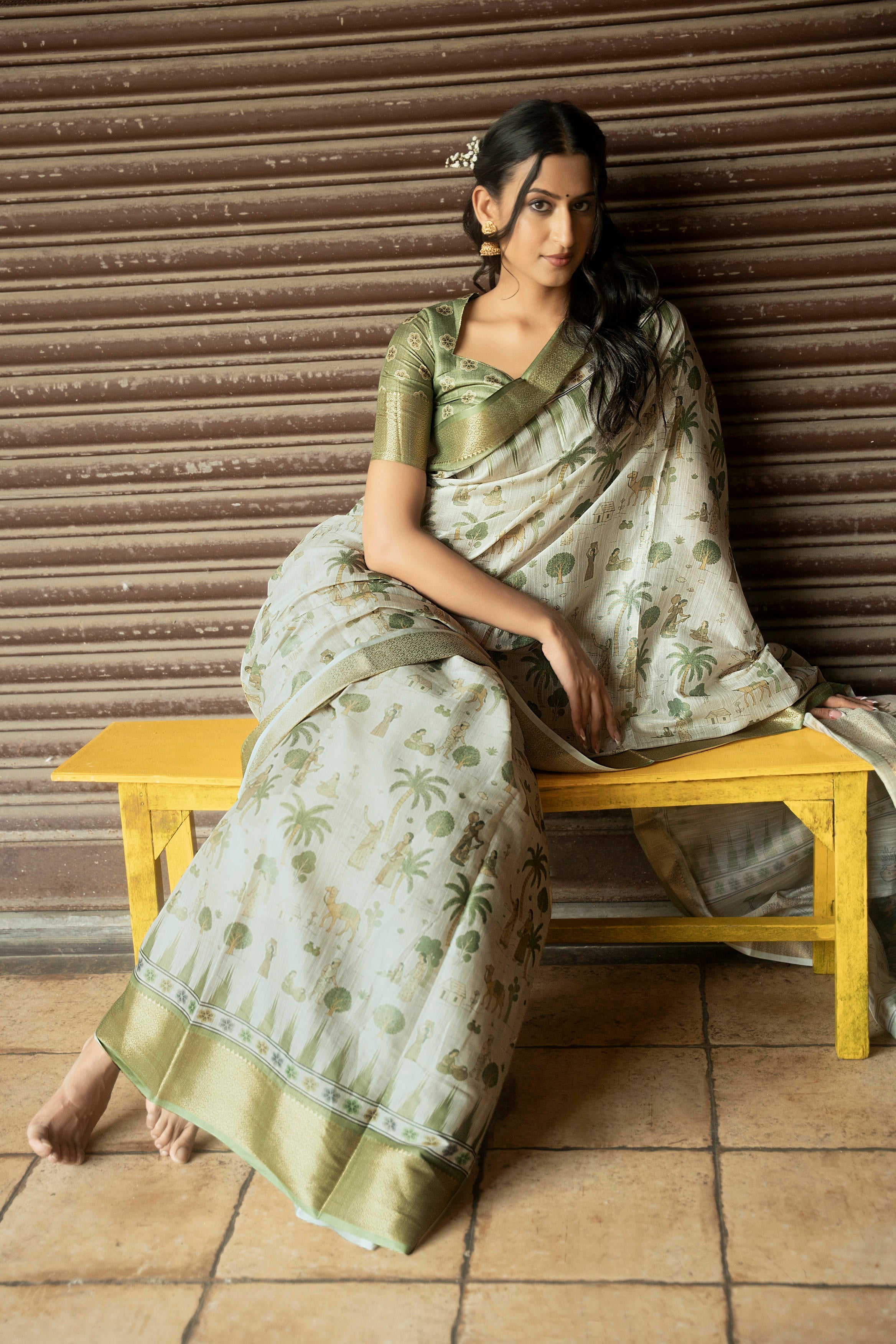 Sage Green and Cream Village Life Illustrative Saree with Antique Gold Zari Border