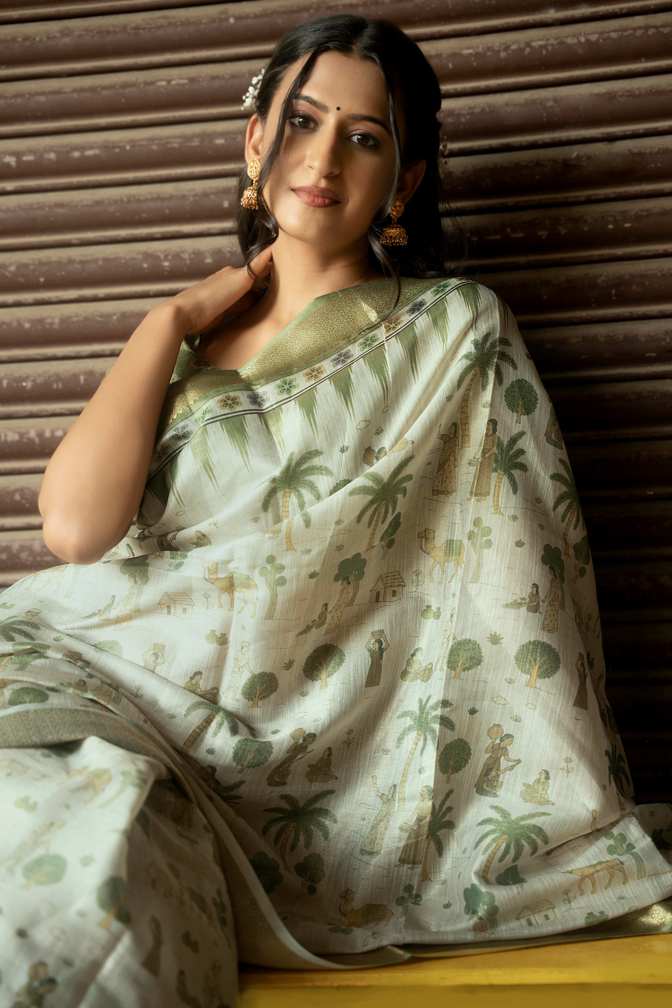 Sage Green and Cream Village Life Illustrative Saree with Antique Gold Zari Border
