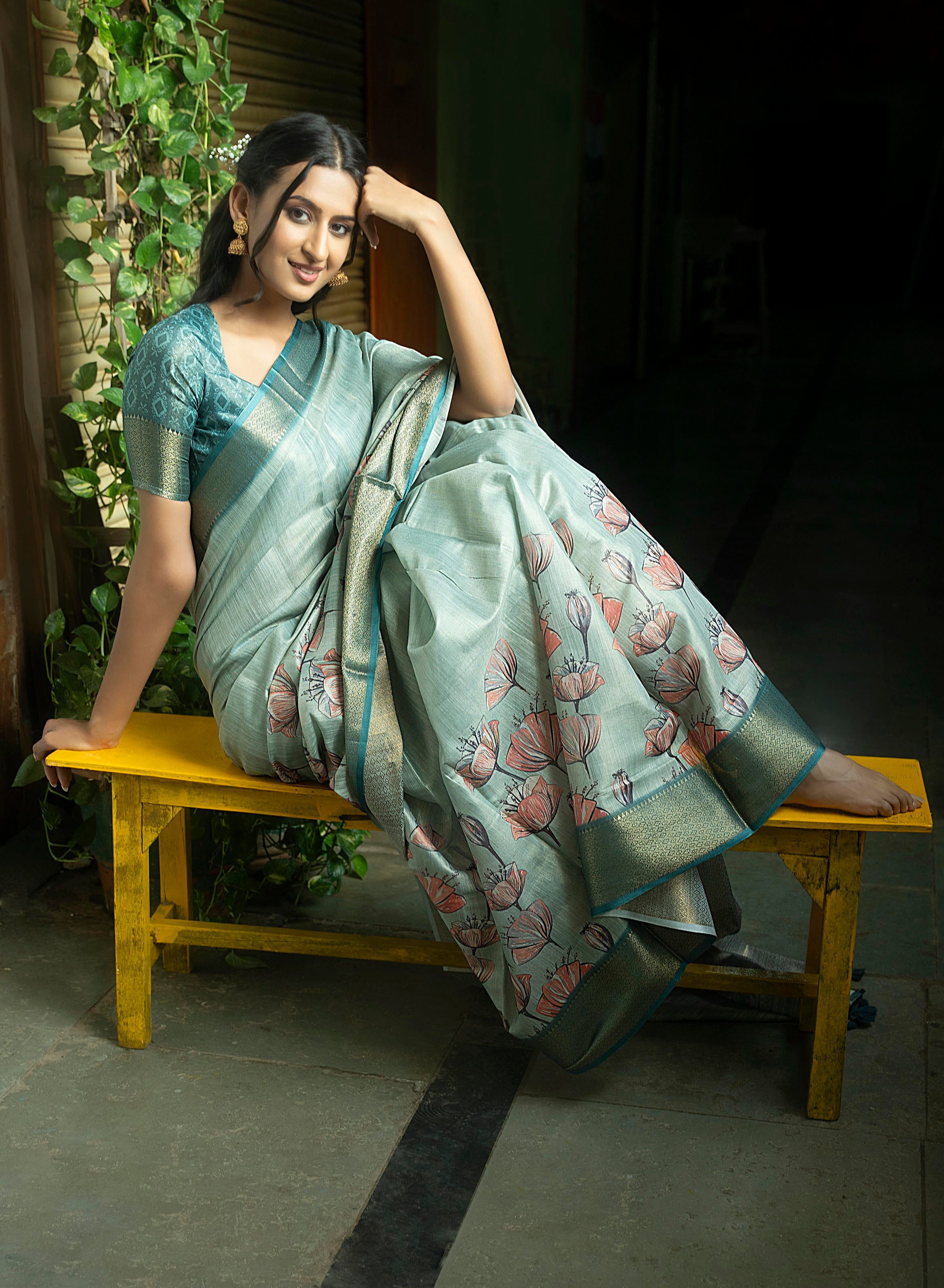 Sage Green Floral Print Saree with Zari Border and Teal Geometric Blouse