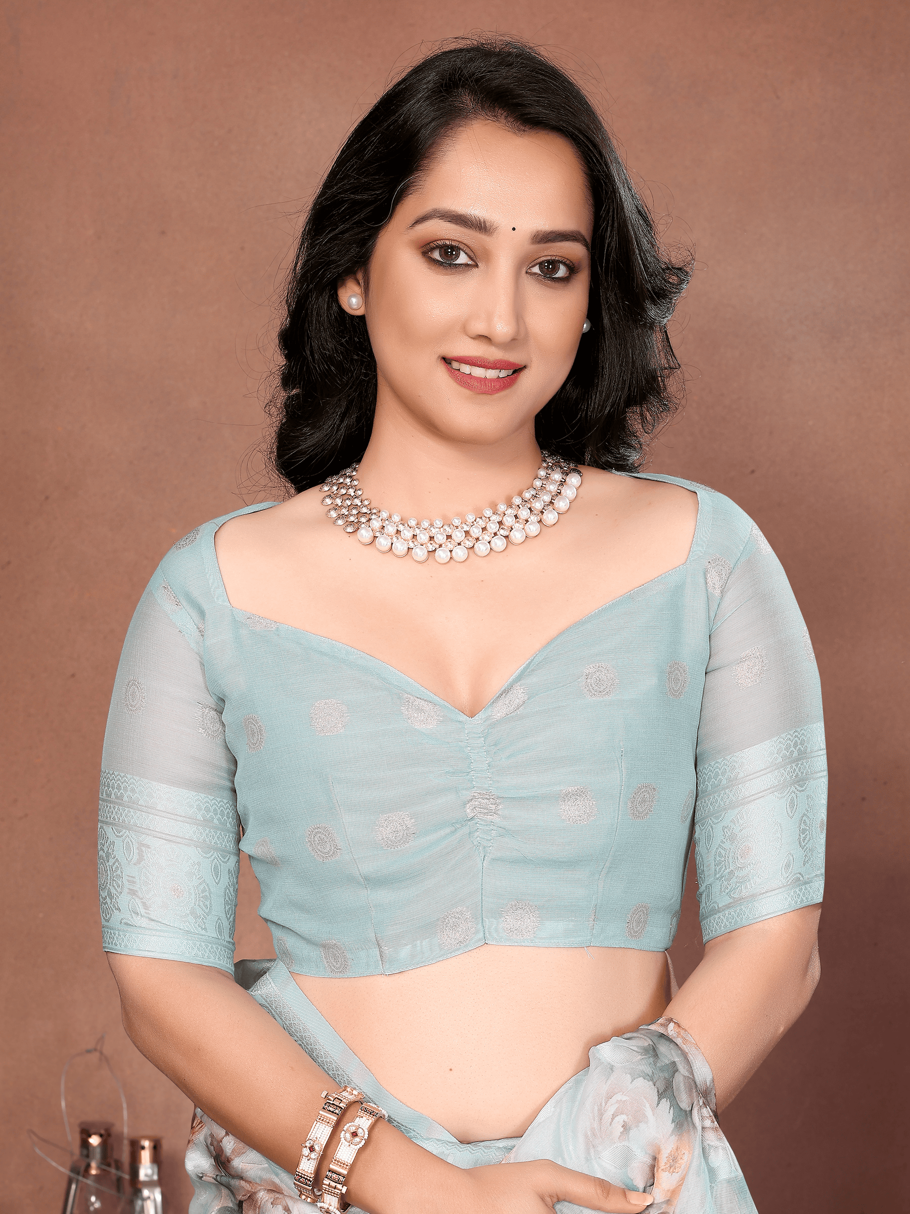 Sea Blue Floral Semi-Sheer Saree with Champagne Gold Zari Pallu
