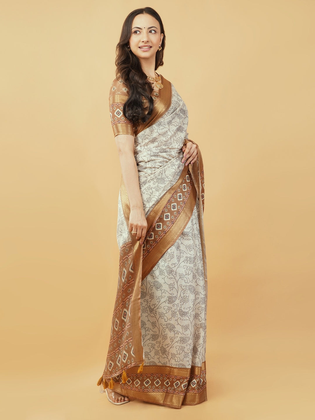 Off-White Kalamkari-Inspired Floral Saree with Copper Zari Border