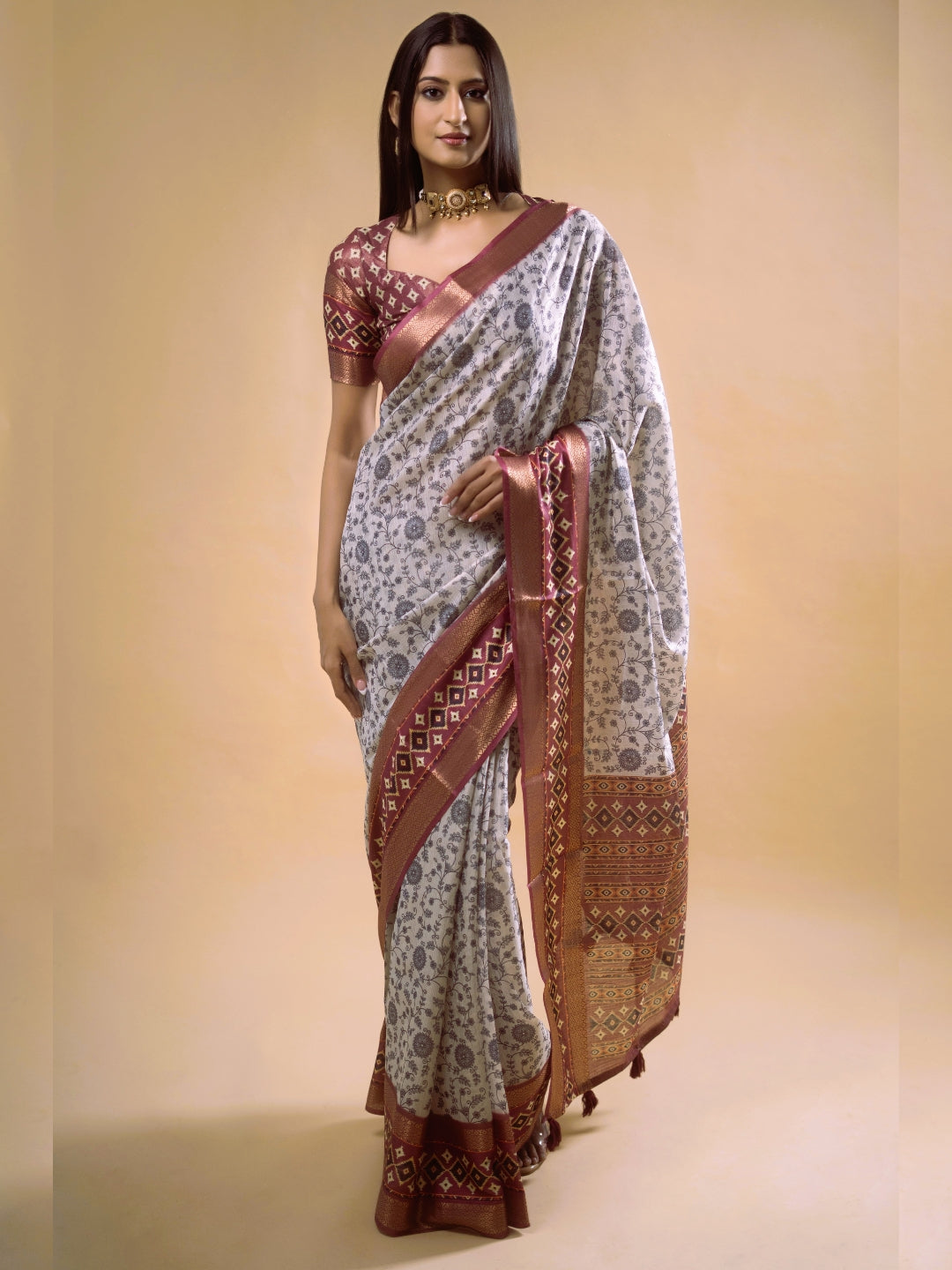 Cream Floral Saree with Maroon Geometric Zari Border and Printed Blouse