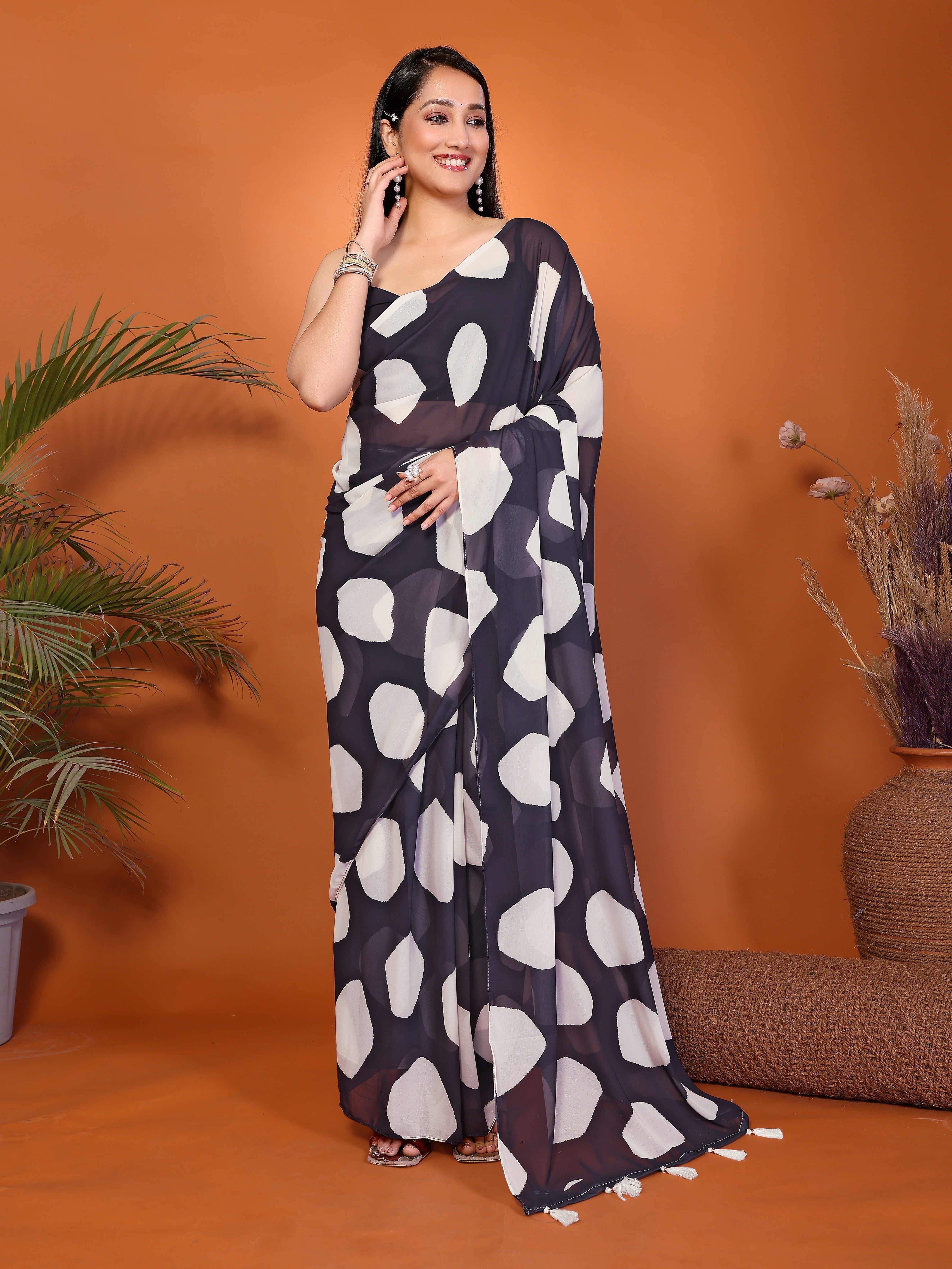 Navy blue and white abstract print ready-to-wear saree with side pocket and sleeveless blouse