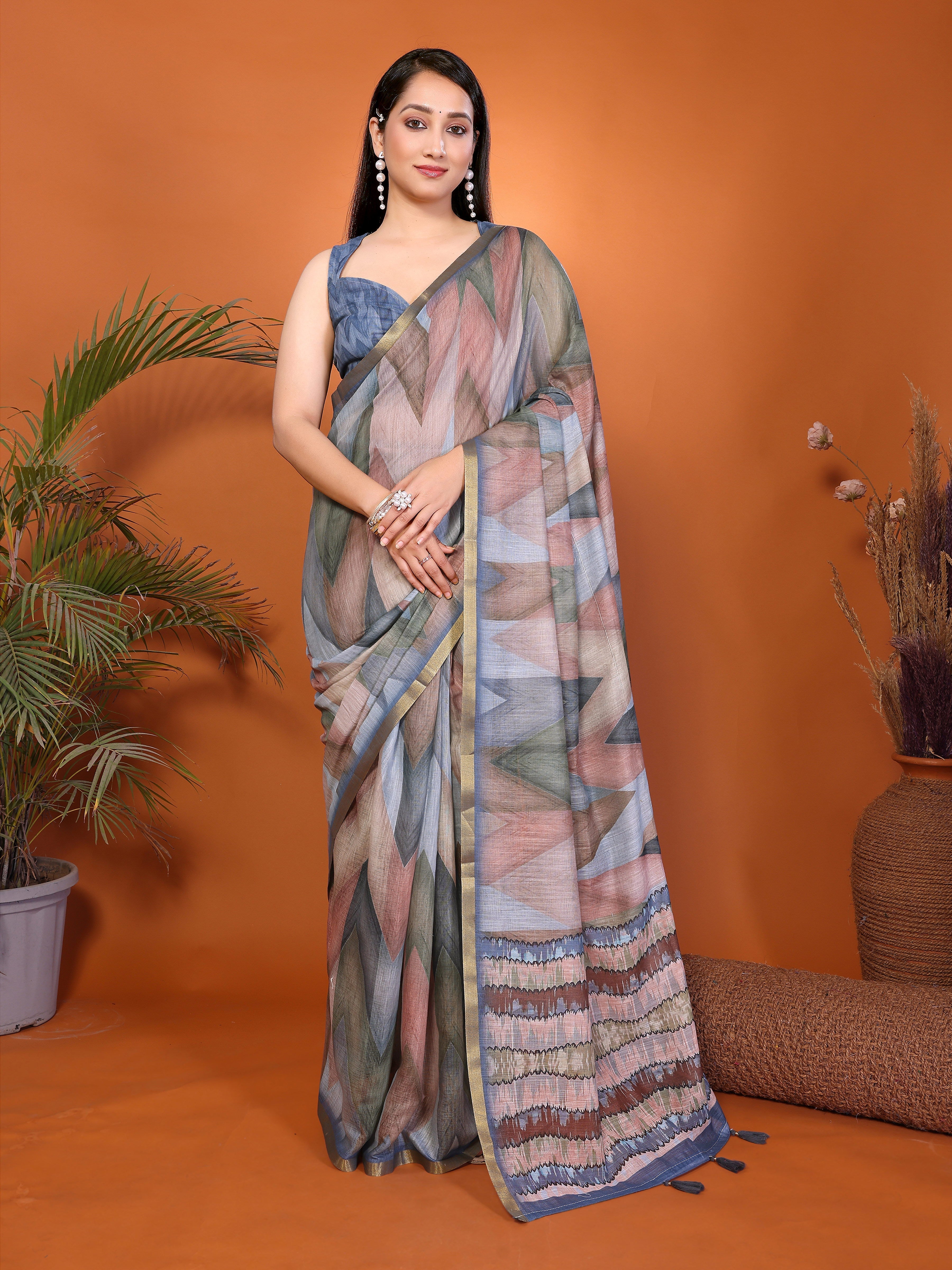 Rust and blue geometric ready-to-wear saree with striped pallu, tassels and side pocket