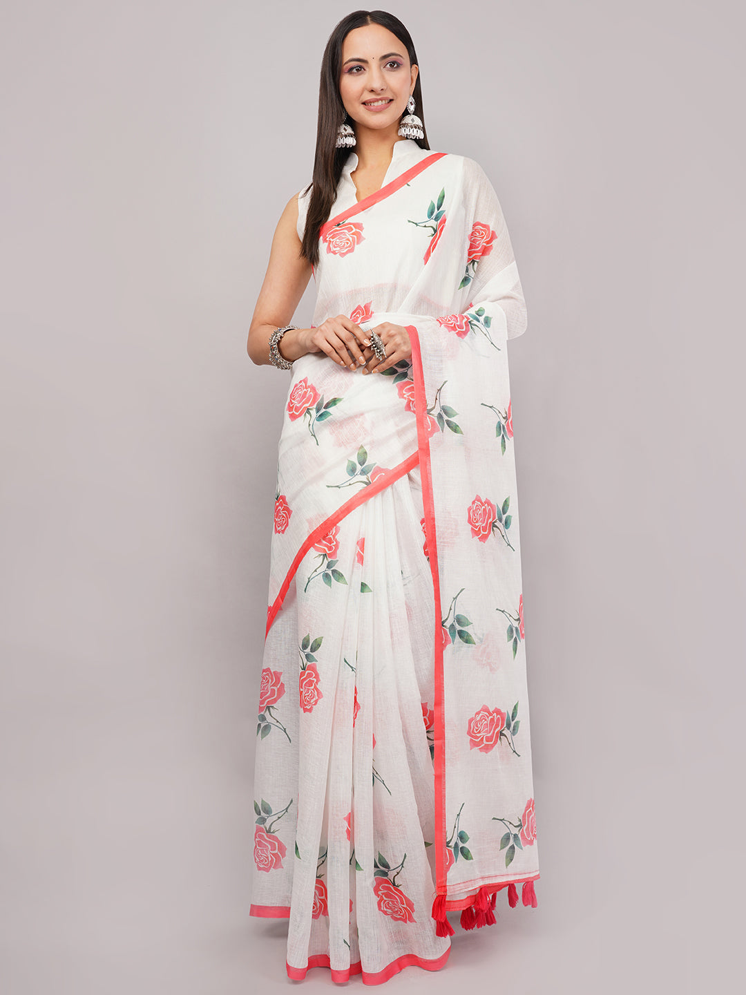 White linen saree with red rose floral print draped by woman for summer wear by Samantha