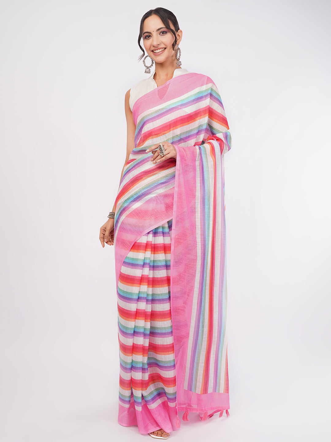 Pink and multicolor vertical striped linen saree draped by woman for summer wear by Samantha