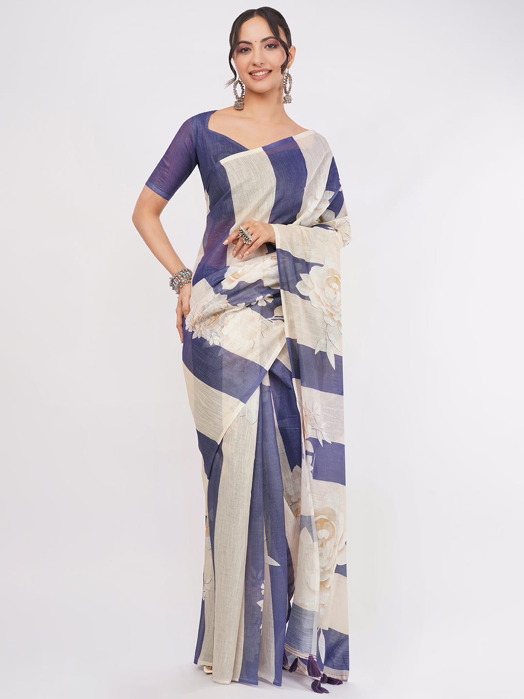 Deep blue and beige striped floral linen saree with solid blue blouse draped by woman for office wear by Samantha