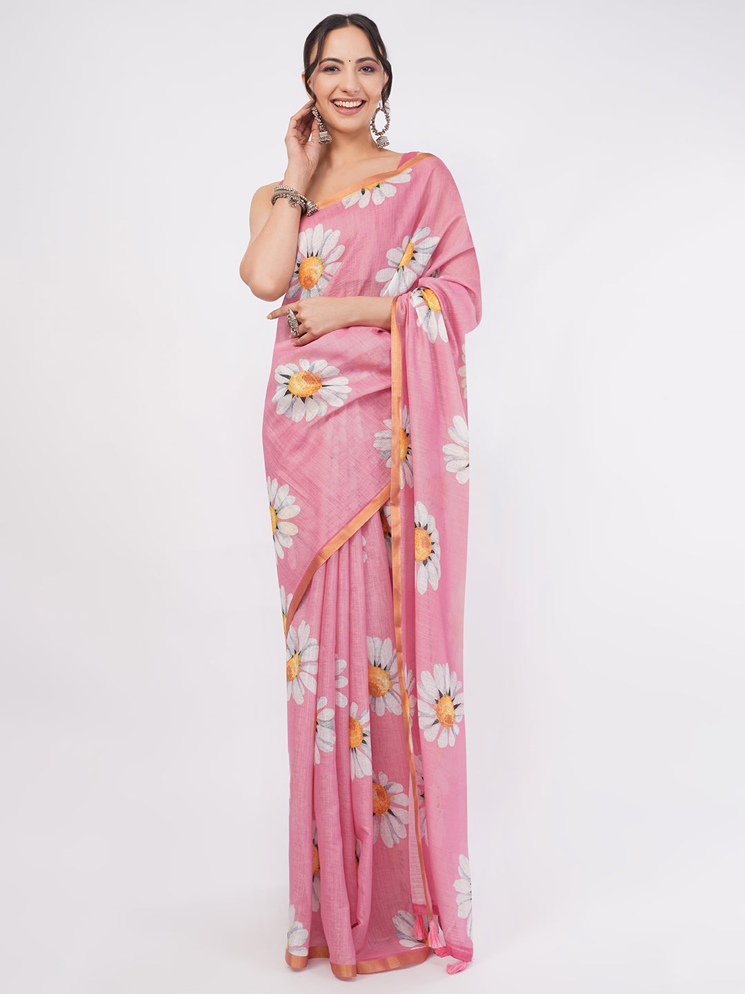 Onion pink linen saree with giant white daisy prints draped by woman for summer day wear by Samantha