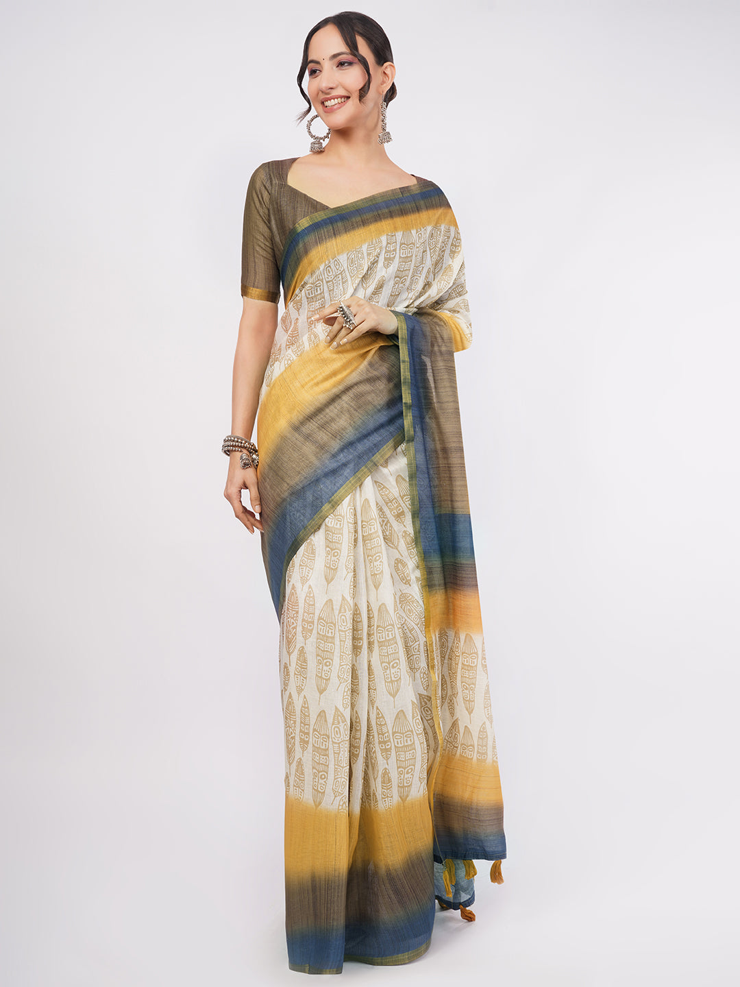 Cream linen saree with mustard feather print and multi-colored border draped by woman for artsy office wear by Samantha