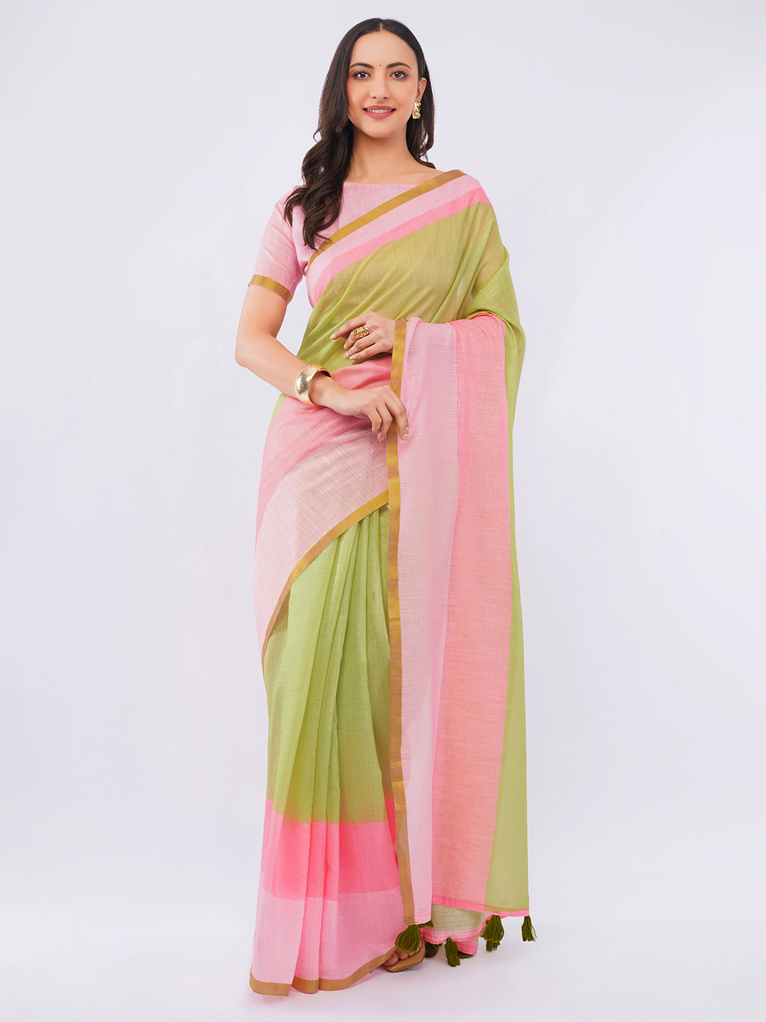 Peach and sage green ombre linen saree with delicate floral print draped by woman for summer wear by Samantha