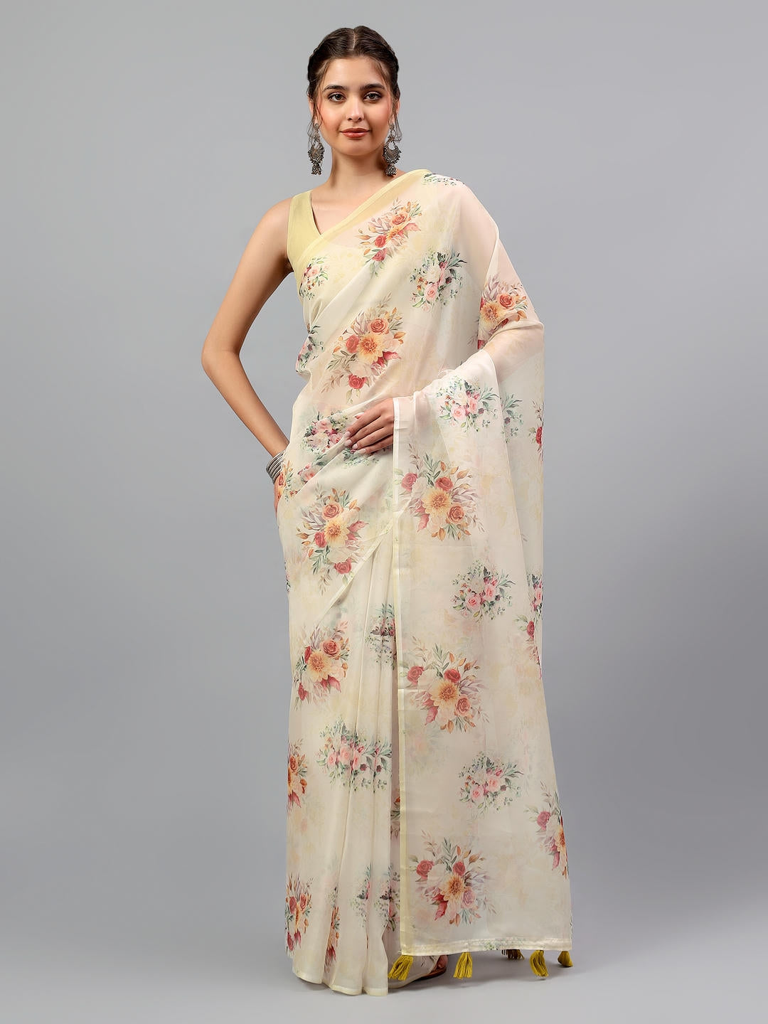 Beautiful woman styled in a sheer earthy rusty green floral printed chiffon saree by Samantha.