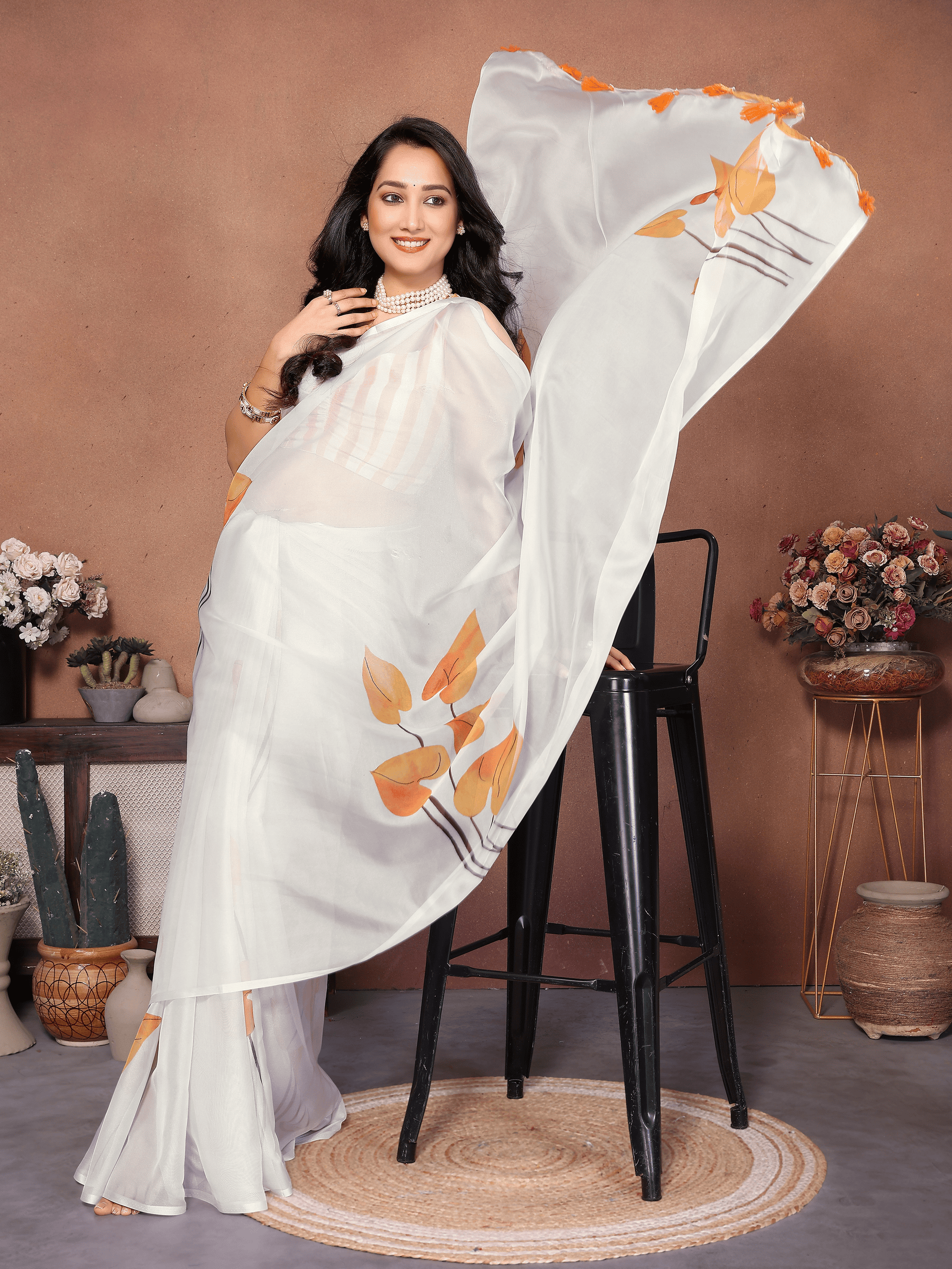 Off-White Botanical Leaf Print Saree with Mustard Piping and Ruched Sleeveless Blouse