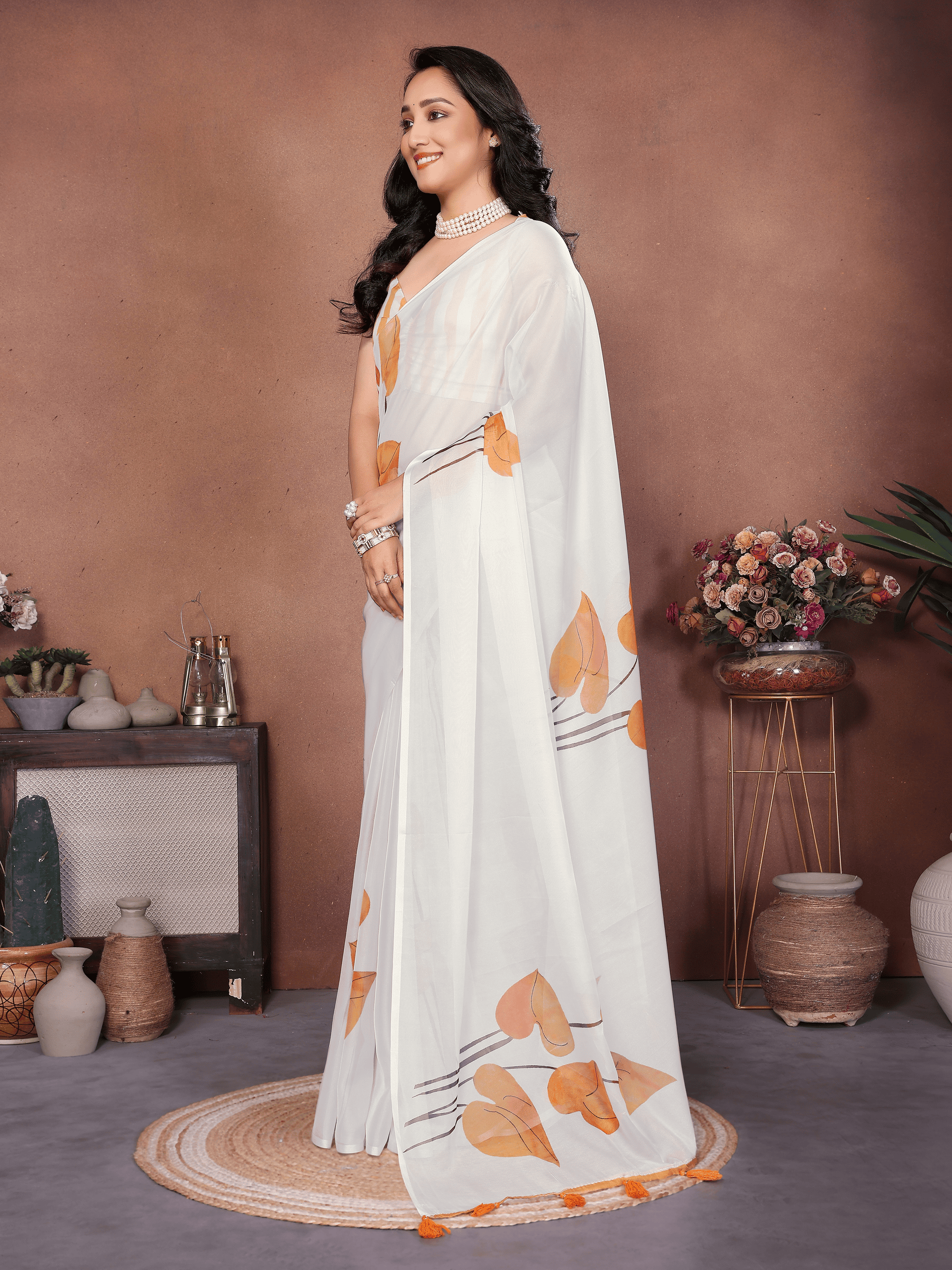 Off-White Botanical Leaf Print Saree with Mustard Piping and Ruched Sleeveless Blouse