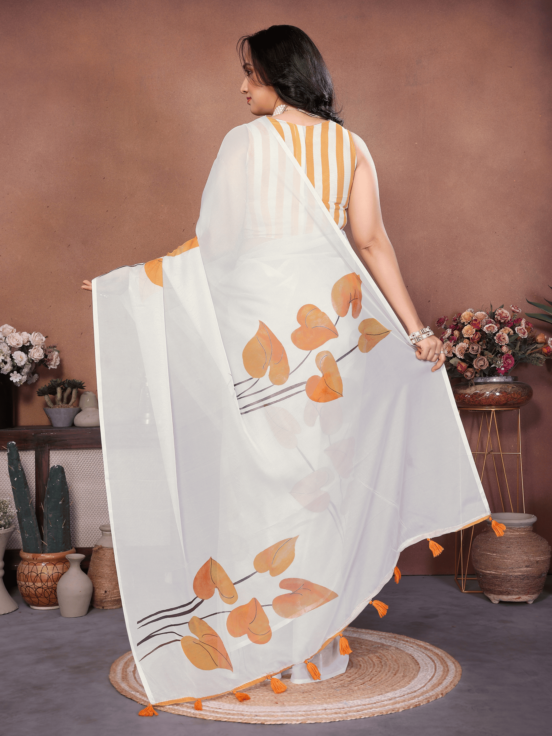 Off-White Botanical Leaf Print Saree with Mustard Piping and Ruched Sleeveless Blouse
