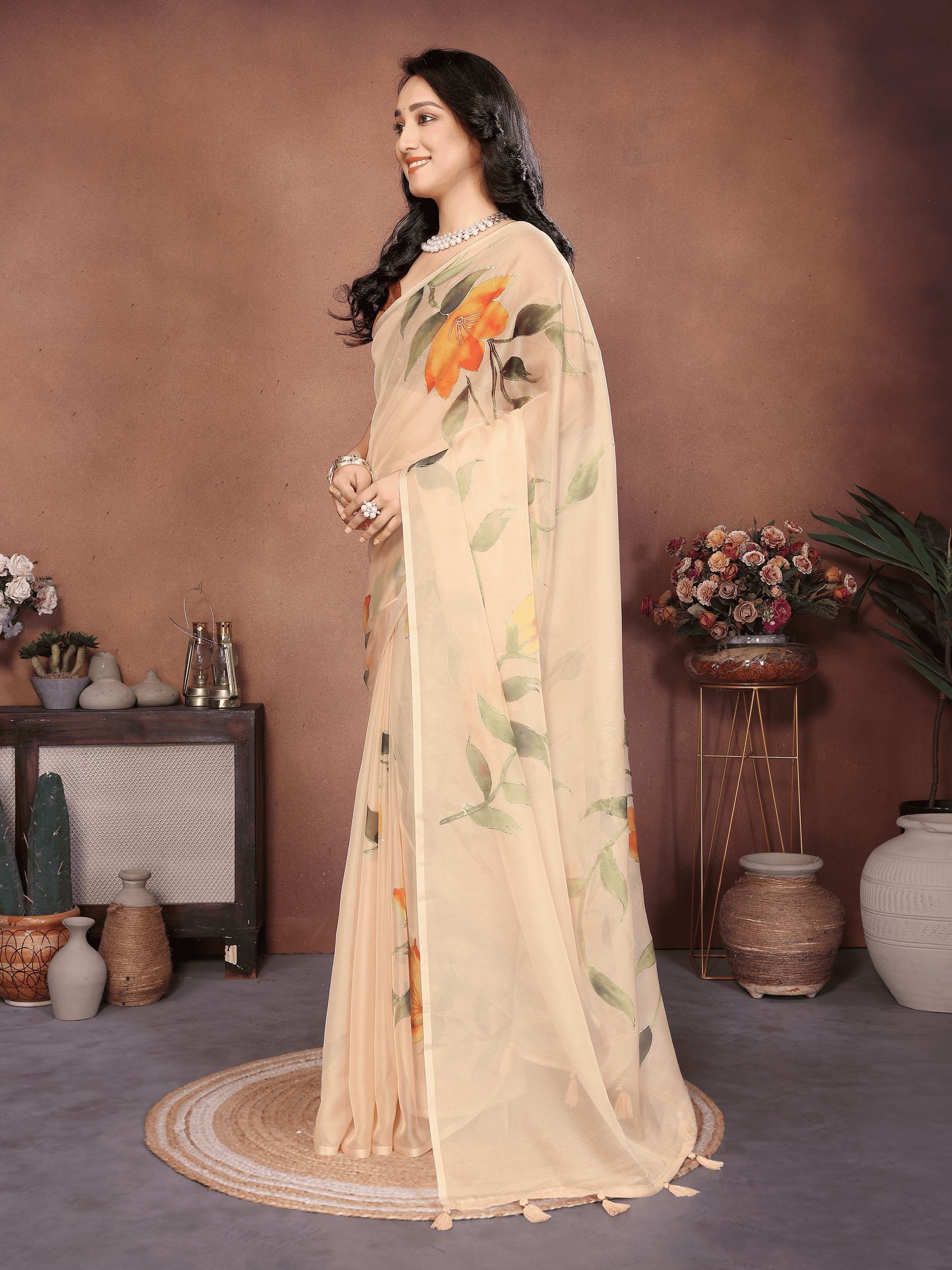 Cream Floral Print Saree with Orange Lily Motifs and Ruched Bronze Blouse