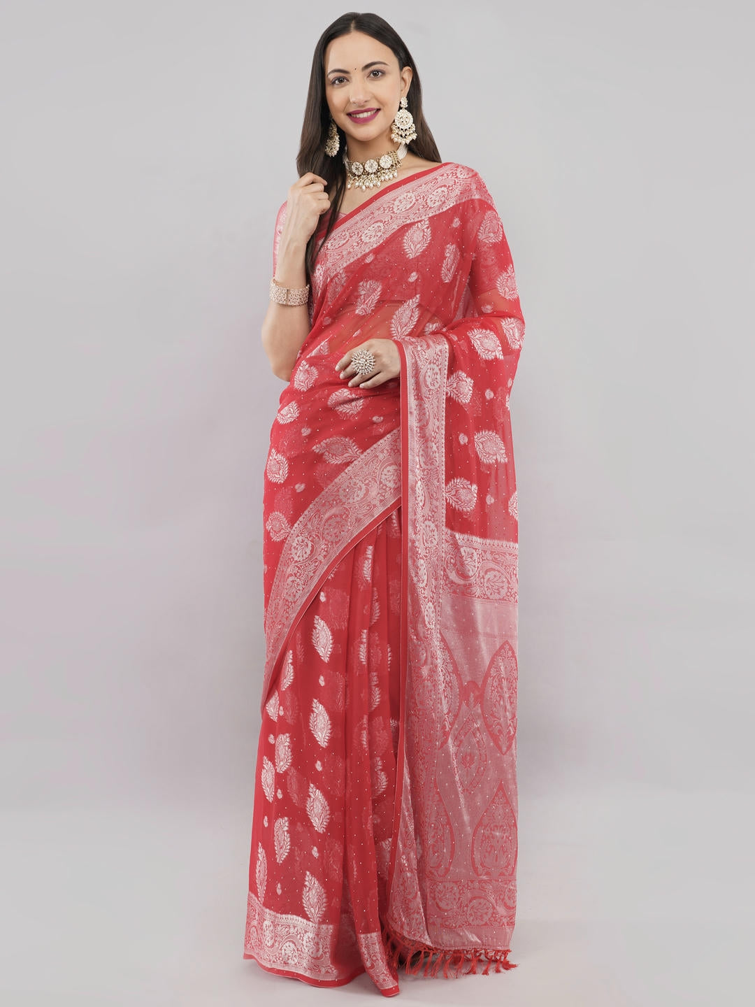 Beautiful woman styled in a classic red and white geometric printed georgette saree featuring an abstract design and a matching unstitched blouse by Samantha.